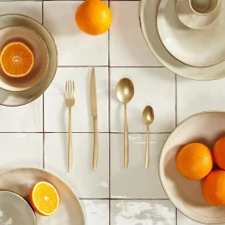 Juegos<CASA Roxanne Cubierto De 16 Piezas Oro Claro